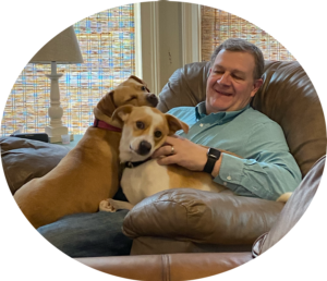 Photo of Richard and his two dogs